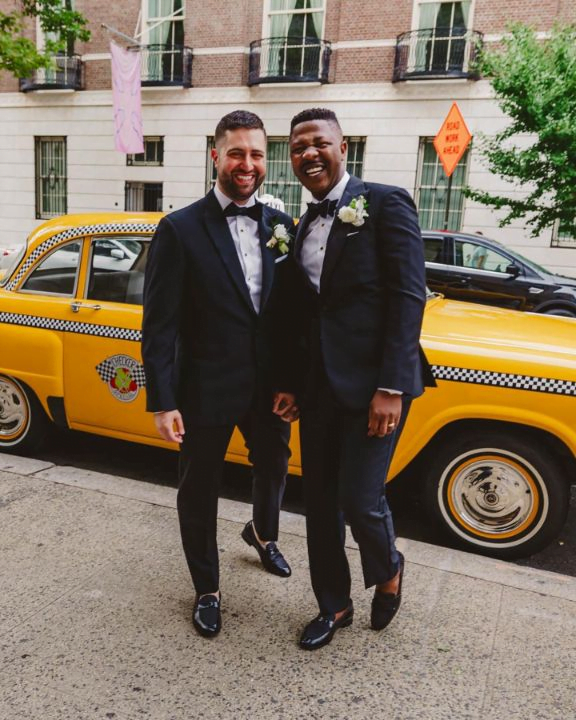 Nigerian man shares wedding photos of his gay marriage to a white man in America on social media.