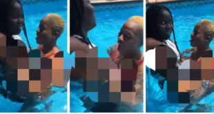 Lady plays with the b()()bs of her friend in a pool (watch video)