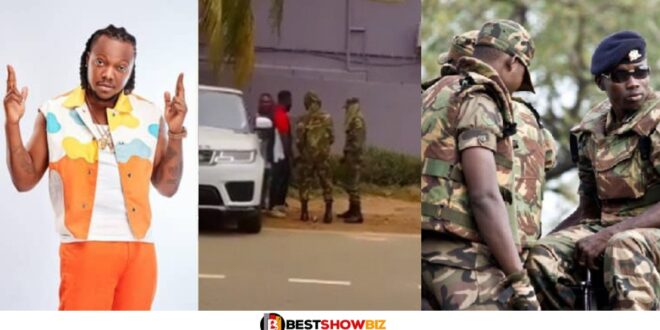 Military Men strips of musician’s military outfit in public (Video)