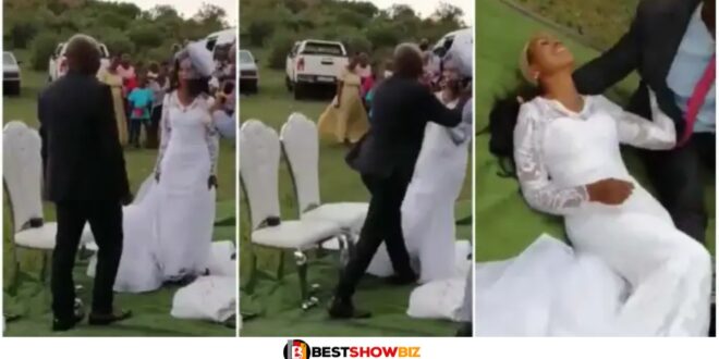 Groom roughly k!ss his bride at a wedding causing her wig to fall off (watch video)