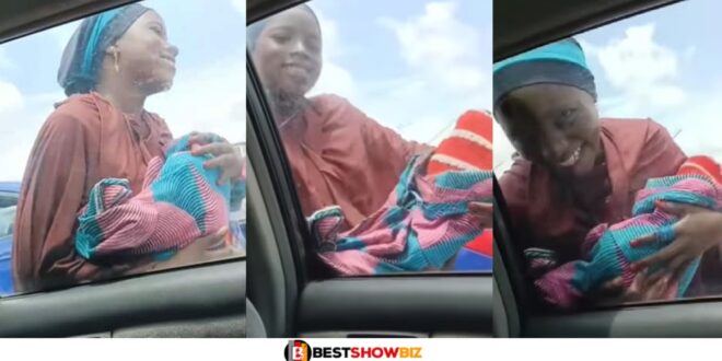 Beggar caught begging for money with a fake baby (Watch video)
