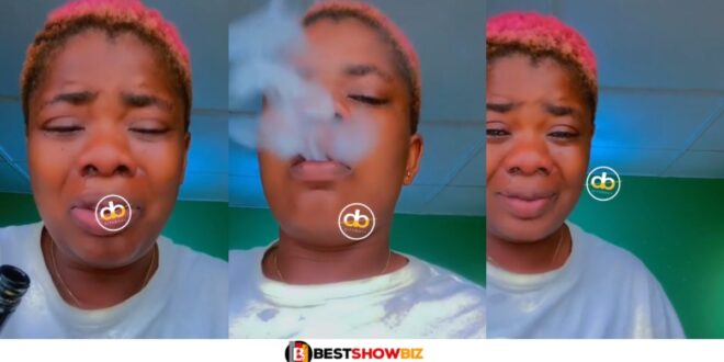 Lady records herself drinking and smoking as she cries over a broken heart (watch video)