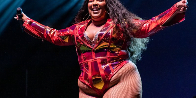 how tall is lizzo? (Lizzo's height)