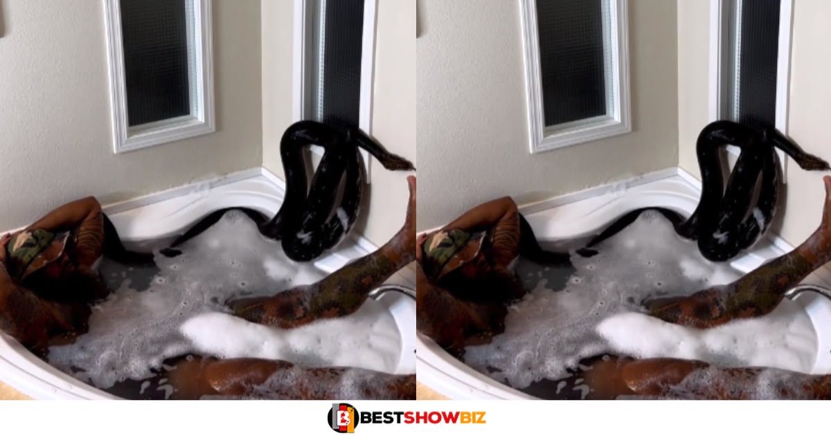 Man Spotted Bathing With A Python Snake (watch video)
