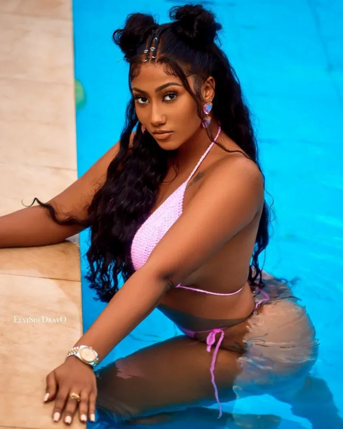 Hajia 4Real Stuns The Internet With A Hot Pink Bikini Outfit Displaying Her Big "Nyᾶsh'