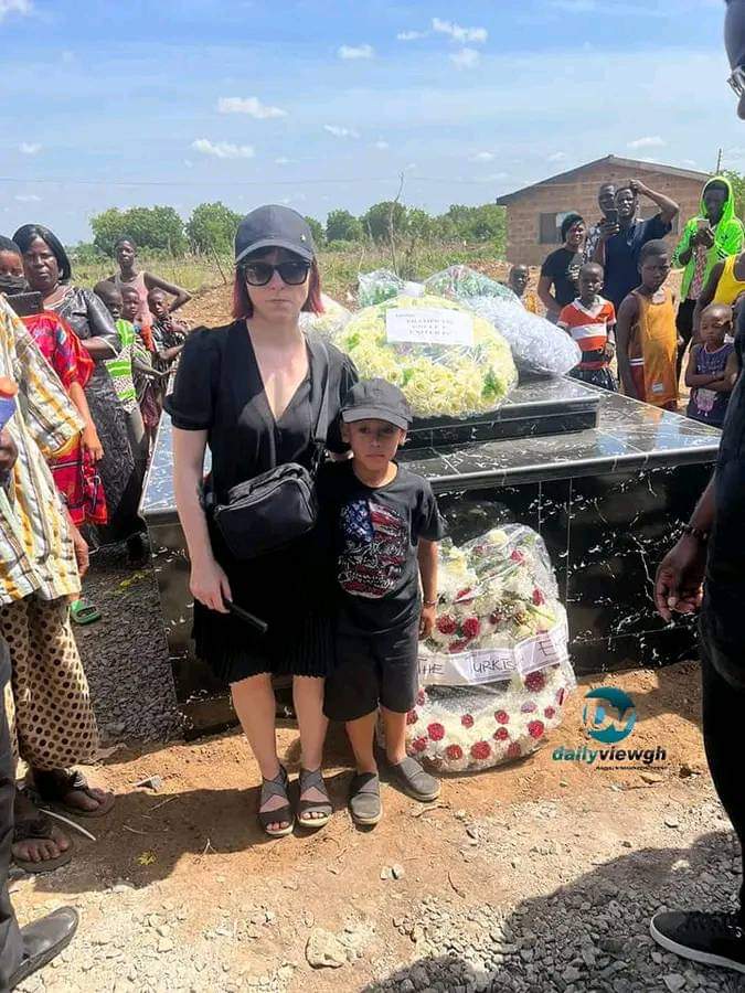 Christian Atsu’s wife and son pay their last visit to his tomb before leaving Ghana - Photo