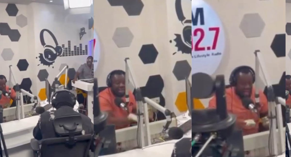 Medikal gives bundles of cedis to Giovanni during an interview - Video
