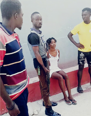 A suspected Female armed robber, arrested with 2 others in Central Region