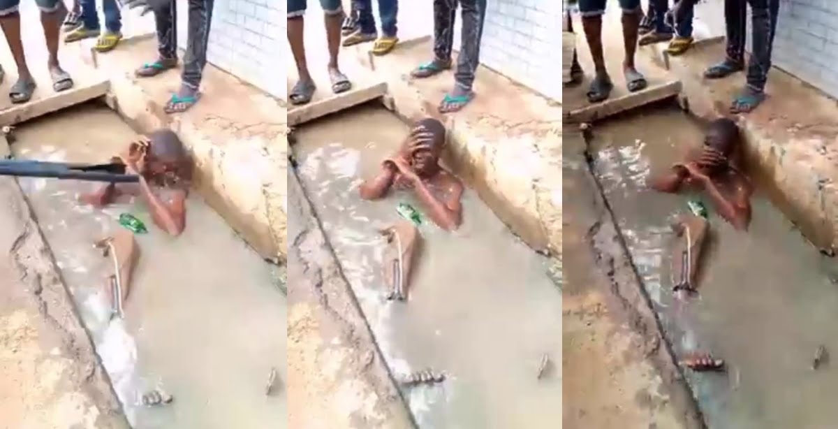 Suspected Phone Thief Made To Swim In Dirty Gutter (Video)