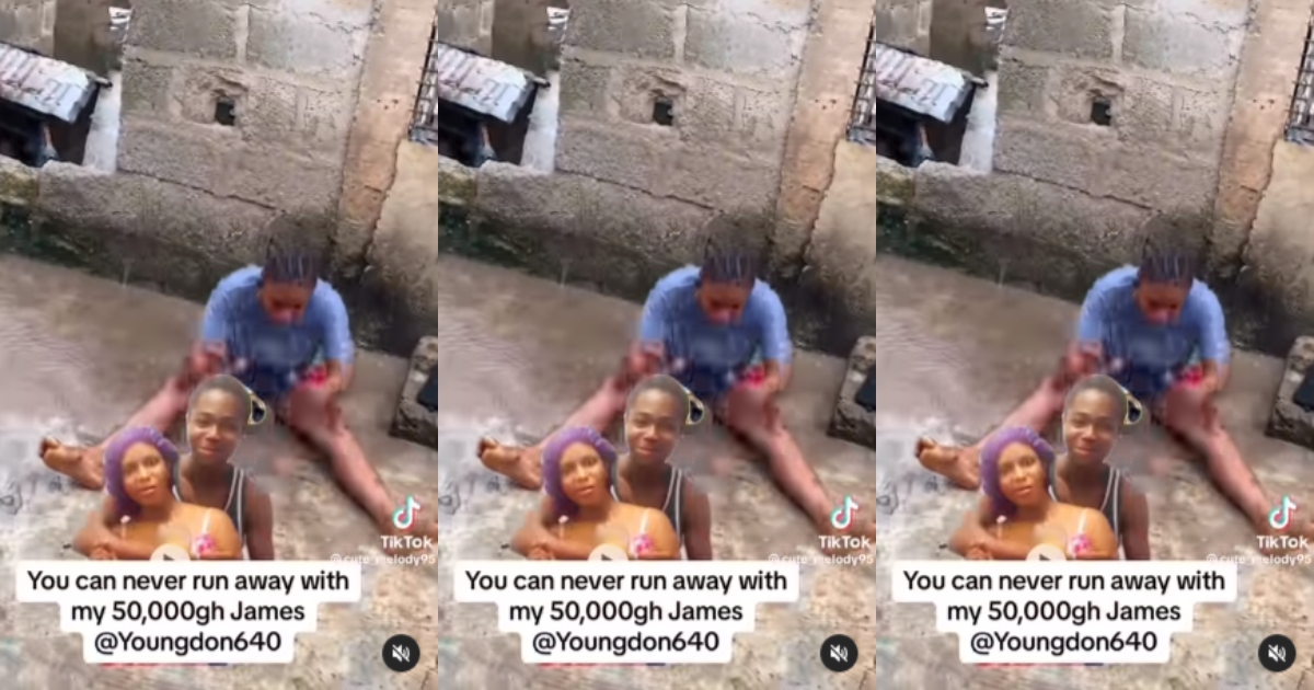 (Video) Young Lady Sits In Rain And Cursɛs Her Boyfriend For Blocking Her After Traveling To USA With Her GH¢50,000 Support