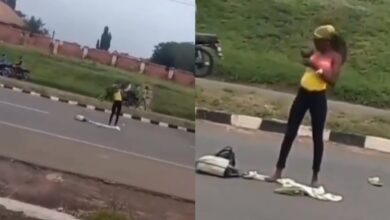 Lady goes crazy after she was dropped in the middle of the road by a yahoo boy. (watch video)