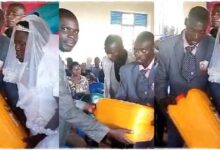 Massive reactions as Man gifts bride and groom an empty jerrycan on their wedding day - Watch Video