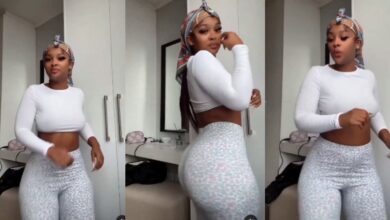beautiful lady turns her closet into a dance floor as she shakes her assets in a white crop top