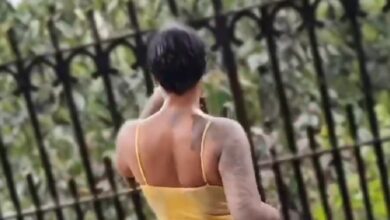 Wet Lady Flaunts Her Cleavage In A See-through Dress As She Tw3rks In The Rain To Popular 'Water' Song - Video