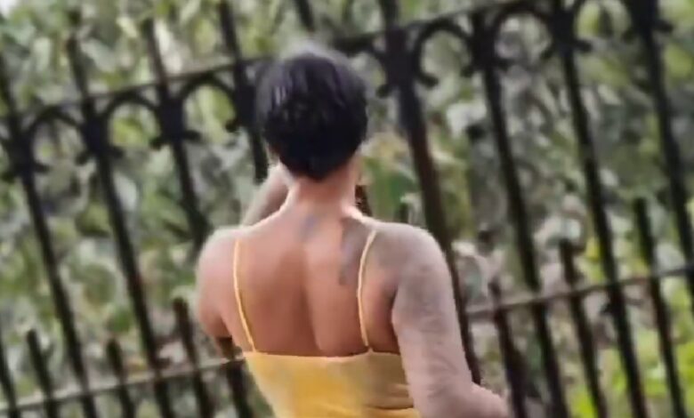 Wet Lady Flaunts Her Cleavage In A See-through Dress As She Tw3rks In The Rain To Popular 'Water' Song - Video