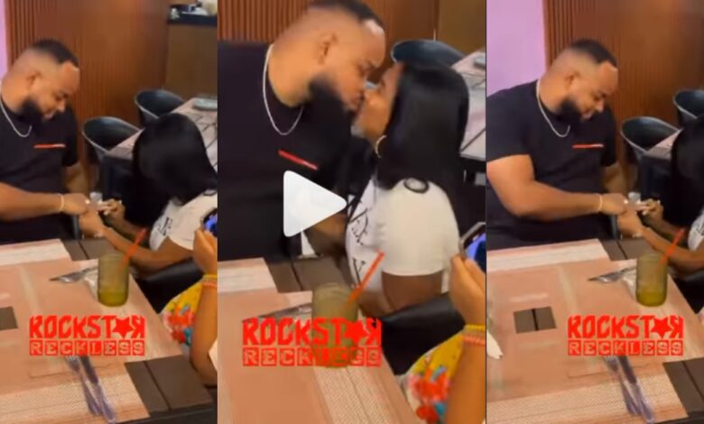After 9 Years Of Dating, A Lady Goes Down On Her Knees To Propose Marriage To Her Boyfriend In A Video
