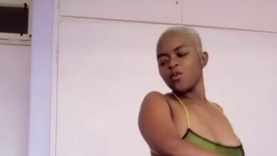 Pretty lady with short hair and green dress shakes her backside as she dances in a new video (Watch)